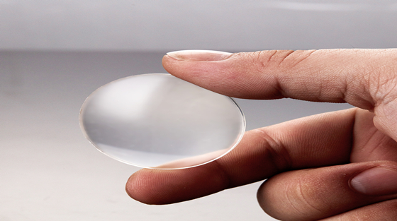 What kind of material does the LED lens use for better effect?